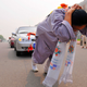 Illustration for article titled Chinese Woman Pulls Six Cars With Her Hair